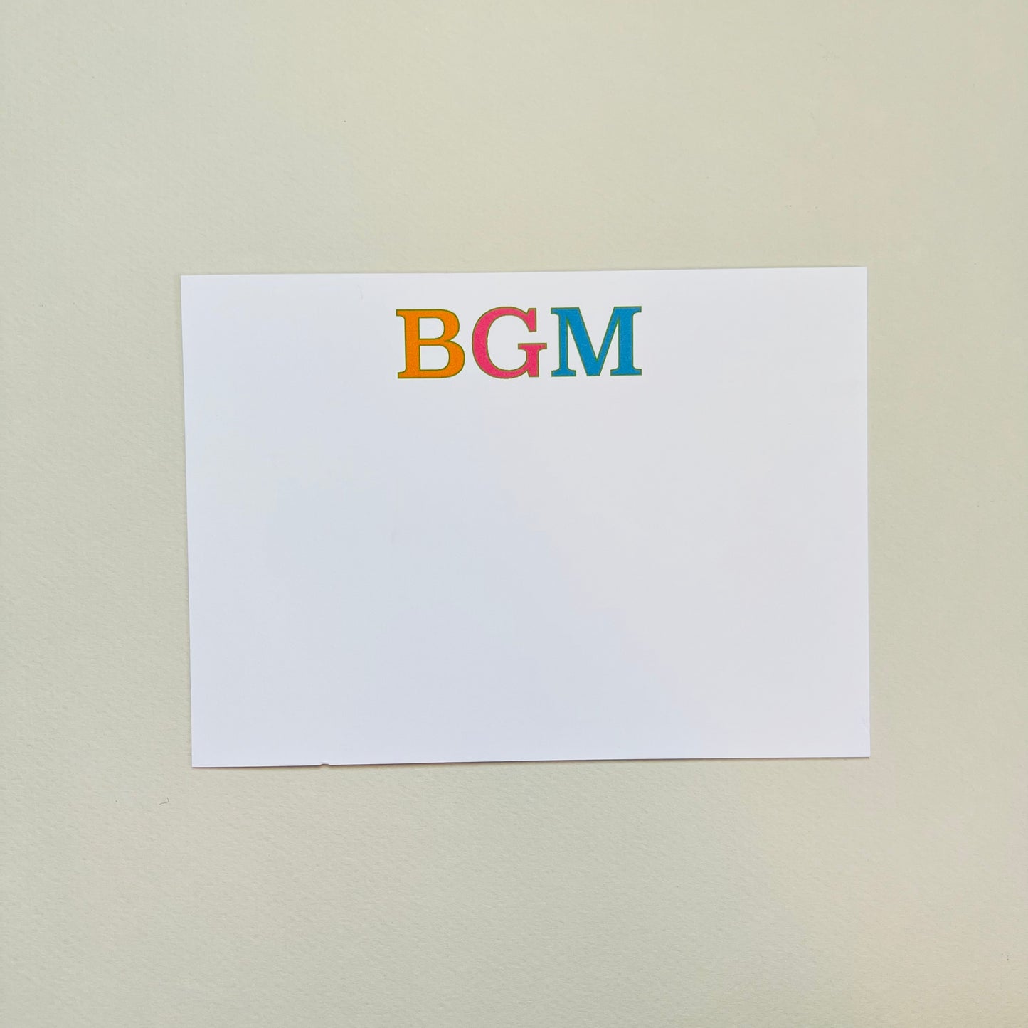 Each letter is outlined in lime green. This card measures 6.25" x 4.25". The monogram on this card is first name initial, middle name initial and last name initial.